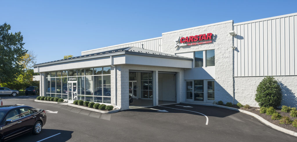 exterior and front entrance of Carstar auto dealership