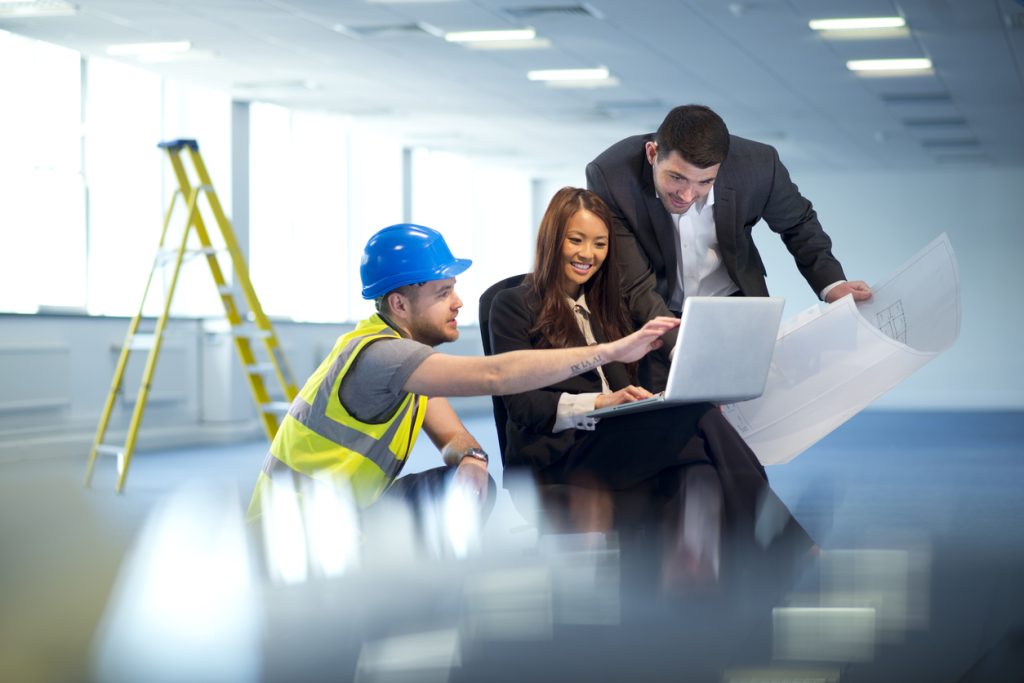 business people discuss how to make a Renovation Stress Free